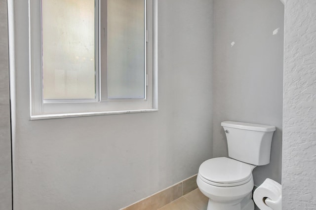 8730 SW 21st St, Miramar, FL 33025 - bathroom featuring toilet and tile patterned floors