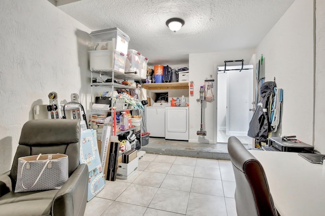 8730 SW 21st St, Miramar, FL 33025 - laundry room featuring independent washer and dryer, a textured ceiling, and light tile patterned flooring