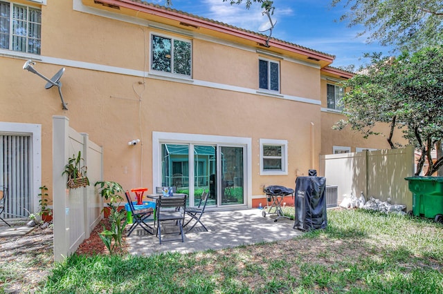 8730 SW 21st St, Miramar, FL 33025 - rear view of house featuring a patio and stucco siding