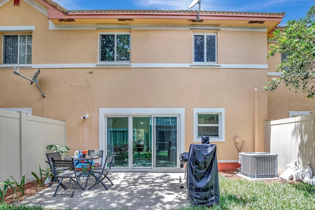 8730 SW 21st St, Miramar, FL 33025 - back of property with stucco siding and a patio area