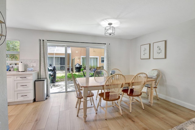 8730 SW 21st St, Miramar, FL 33025 - dining space featuring light wood-style flooring and baseboards
