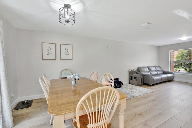 8730 SW 21st St, Miramar, FL 33025 - dining space with light wood finished floors and baseboards