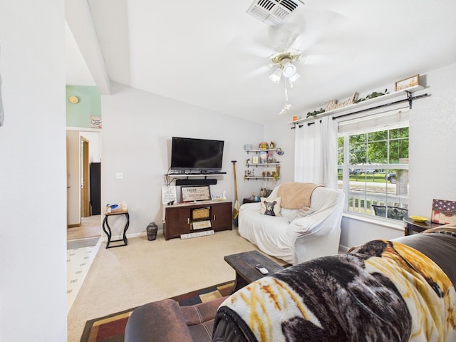 7281 NW 90th Ct, Okeechobee, FL 34972 - carpeted living area featuring lofted ceiling and ceiling fan