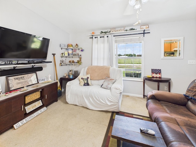 7281 NW 90th Ct, Okeechobee, FL 34972 - living area featuring carpet floors and vaulted ceiling