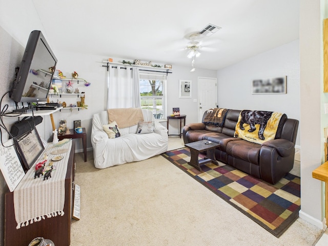 7281 NW 90th Ct, Okeechobee, FL 34972 - carpeted living area featuring a ceiling fan and baseboards