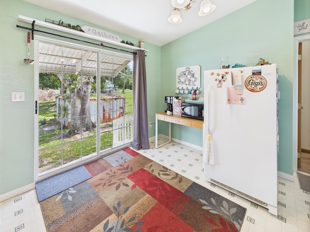 7281 NW 90th Ct, Okeechobee, FL 34972 - interior space with a chandelier and baseboards