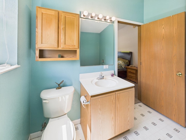 7281 NW 90th Ct, Okeechobee, FL 34972 - bathroom featuring vanity and toilet