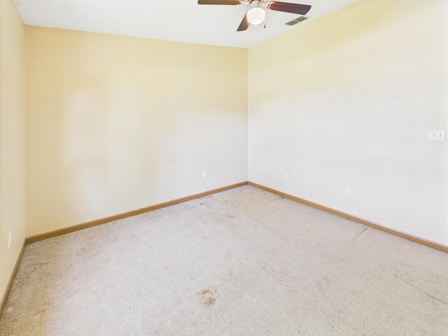 7281 NW 90th Ct, Okeechobee, FL 34972 - empty room featuring ceiling fan and light colored carpet