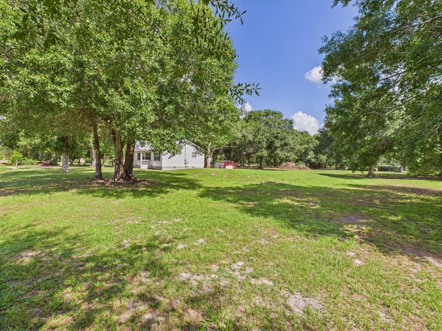 7281 NW 90th Ct, Okeechobee, FL 34972 - view of grassy yard