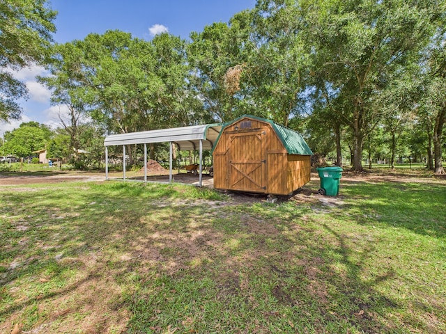 7281 NW 90th Ct, Okeechobee, FL 34972 - view of green lawn featuring a carport and a storage unit