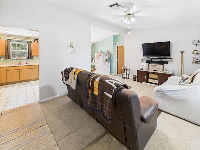 7281 NW 90th Ct, Okeechobee, FL 34972 - living area with a ceiling fan, light colored carpet, and lofted ceiling