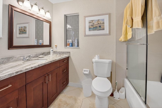 11814 N Lake Dr, Boynton Beach, FL 33436 - full bathroom featuring vanity, tile patterned floors, and shower / bath combination with glass door