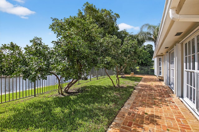 11814 N Lake Dr, Boynton Beach, FL 33436 - fenced backyard with a patio area