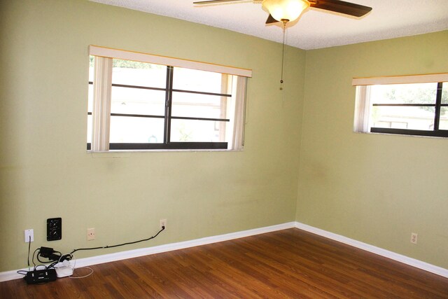 4660 Finchwood Ter Unit B, Boynton Beach, FL 33436 - unfurnished room featuring a ceiling fan and dark wood finished floors