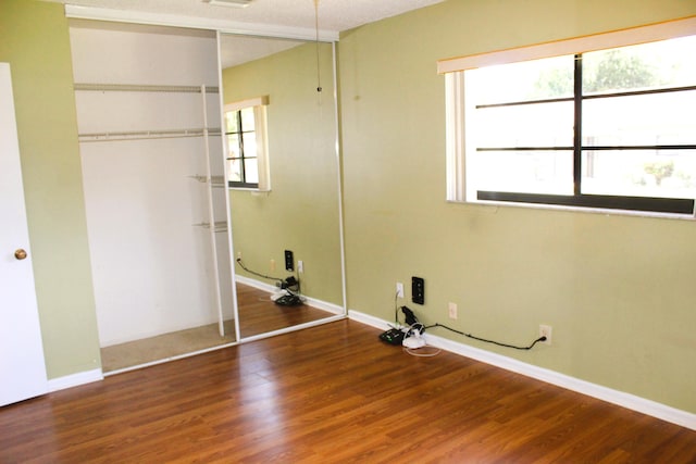 4660 Finchwood Ter Unit B, Boynton Beach, FL 33436 - washroom featuring plenty of natural light and wood finished floors