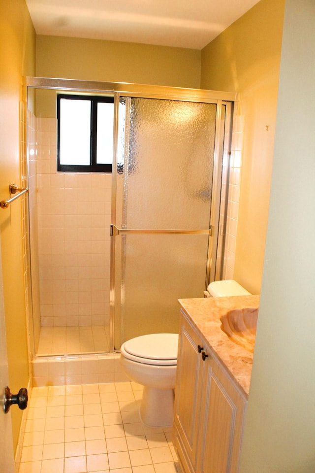 4660 Finchwood Ter Unit B, Boynton Beach, FL 33436 - bathroom with a shower stall, vanity, and tile patterned floors