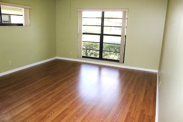 4660 Finchwood Ter Unit B, Boynton Beach, FL 33436 - spare room featuring healthy amount of natural light and wood finished floors