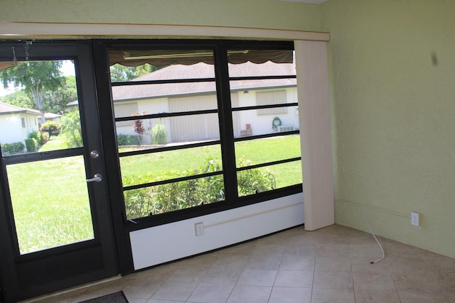 4660 Finchwood Ter Unit B, Boynton Beach, FL 33436 - doorway to outside featuring tile patterned flooring