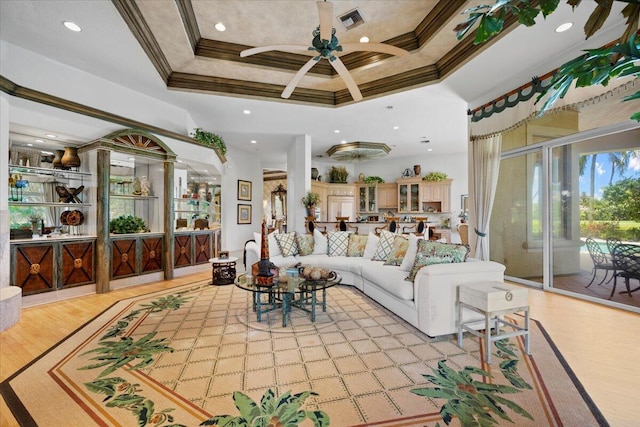 8571 Egret Lakes Ln, West Palm Beach, FL 33412 - living area with ornamental molding, a ceiling fan, coffered ceiling, recessed lighting, and light wood-type flooring