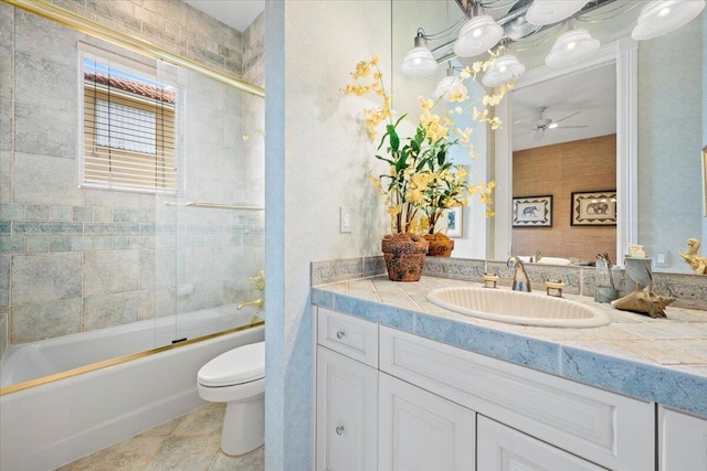 8571 Egret Lakes Ln, West Palm Beach, FL 33412 - bathroom with vanity, a ceiling fan, and bath / shower combo with glass door