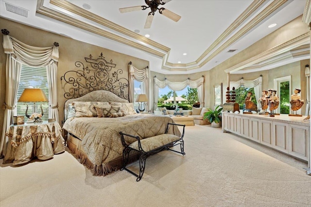 8571 Egret Lakes Ln, West Palm Beach, FL 33412 - carpeted bedroom featuring ornamental molding, a raised ceiling, multiple windows, recessed lighting, and ceiling fan
