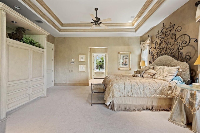 8571 Egret Lakes Ln, West Palm Beach, FL 33412 - bedroom with light colored carpet, ornamental molding, a tray ceiling, and ceiling fan