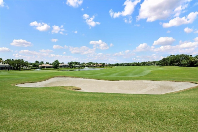 8571 Egret Lakes Ln, West Palm Beach, FL 33412 - view of property's community featuring view of golf course, a yard, and a water view