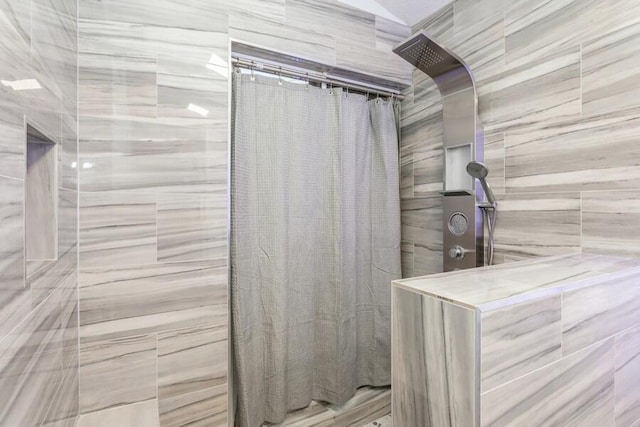 10 Hampton Ct, Palm Beach Gardens, FL 33418 - full bathroom featuring a tile shower