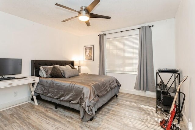 10 Hampton Ct, Palm Beach Gardens, FL 33418 - bedroom with light wood-style flooring and ceiling fan