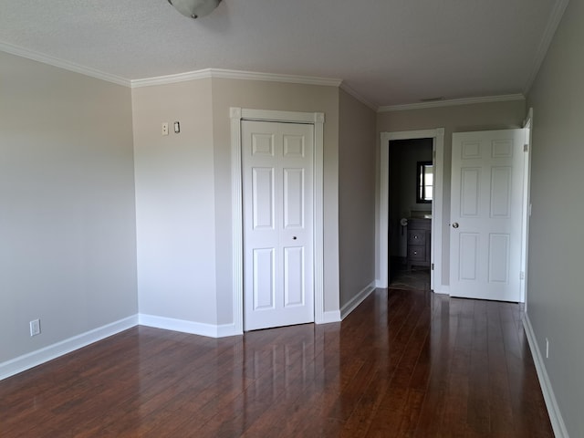 22415 SW 61st Way Unit 204, Boca Raton, FL 33428 - unfurnished bedroom featuring hardwood / wood-style flooring, a closet, and crown molding