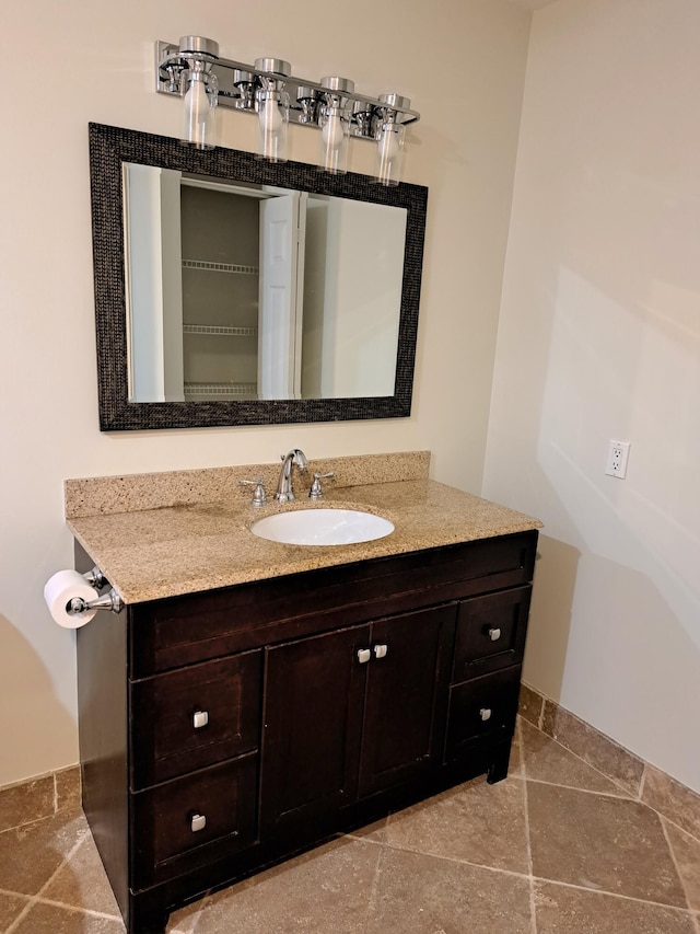 22415 SW 61st Way Unit 204, Boca Raton, FL 33428 - bathroom with vanity and stone finish flooring