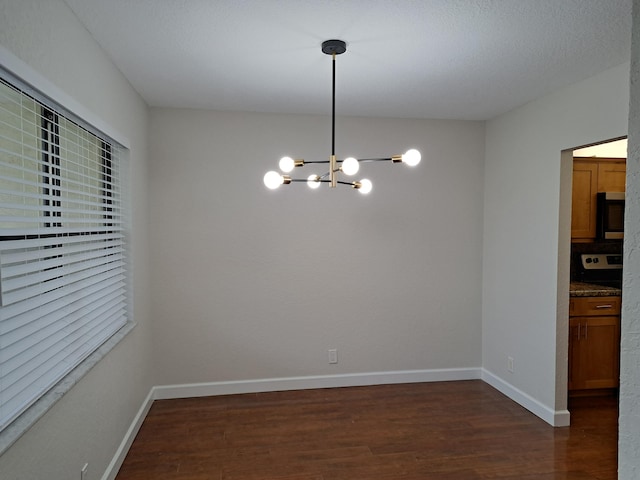 22415 SW 61st Way Unit 204, Boca Raton, FL 33428 - unfurnished dining area with a chandelier and dark wood-style floors