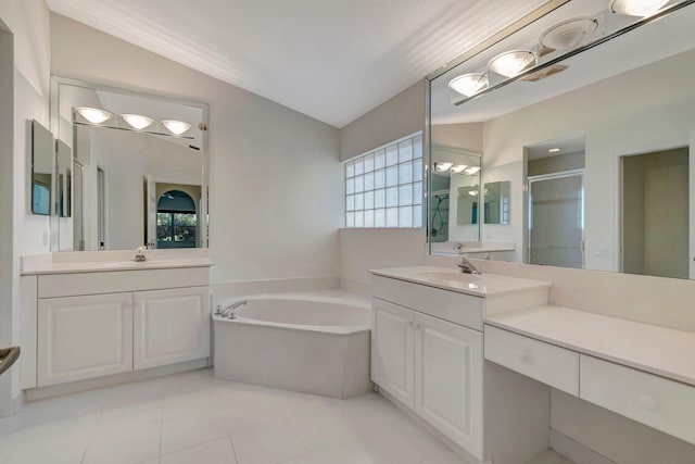 6661 Sherbrook Dr, Boynton Beach, FL 33437 - full bath featuring a shower stall, a bath, two vanities, and tile patterned floors