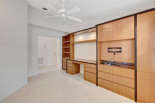 6661 Sherbrook Dr, Boynton Beach, FL 33437 - unfurnished bedroom featuring built in desk and light tile patterned flooring
