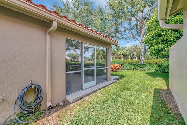 6661 Sherbrook Dr, Boynton Beach, FL 33437 - view of green lawn with a sunroom