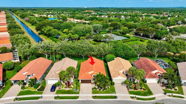 6661 Sherbrook Dr, Boynton Beach, FL 33437 - aerial perspective of suburban area with a large body of water and a tree filled landscape