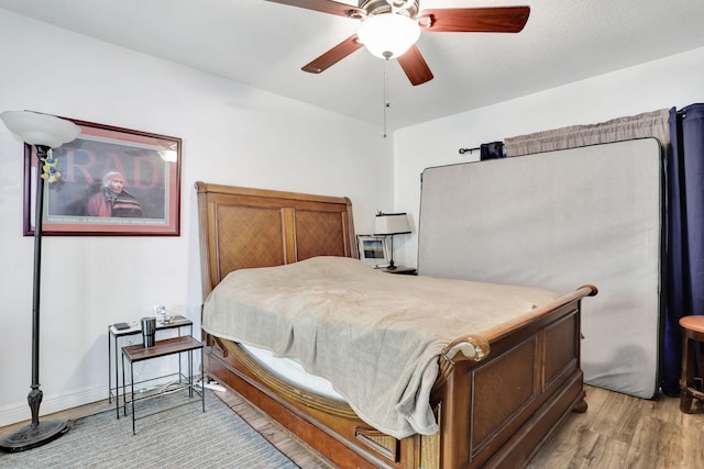461 NW 76th Ave Unit 205, Margate, FL 33063 - bedroom with light wood-style floors and ceiling fan