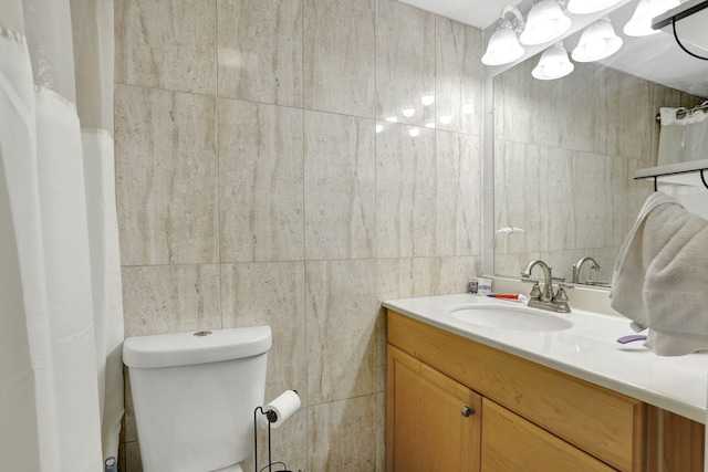 461 NW 76th Ave Unit 205, Margate, FL 33063 - full bathroom featuring vanity, tile walls, and a shower with shower curtain
