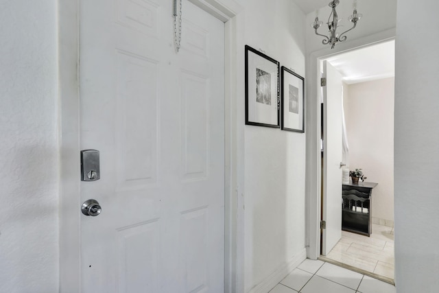461 NW 76th Ave Unit 205, Margate, FL 33063 - corridor featuring light tile patterned flooring and baseboards