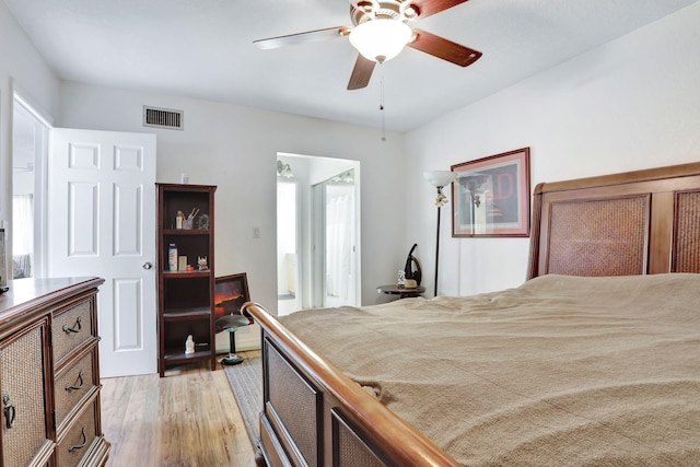 461 NW 76th Ave Unit 205, Margate, FL 33063 - bedroom with light wood-style floors and ceiling fan