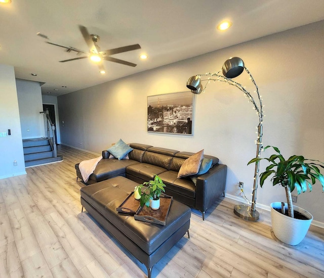 2247 SW Cape Cod Dr, Port Saint Lucie, FL 34953 - living room with wood finished floors, a ceiling fan, stairway, and recessed lighting