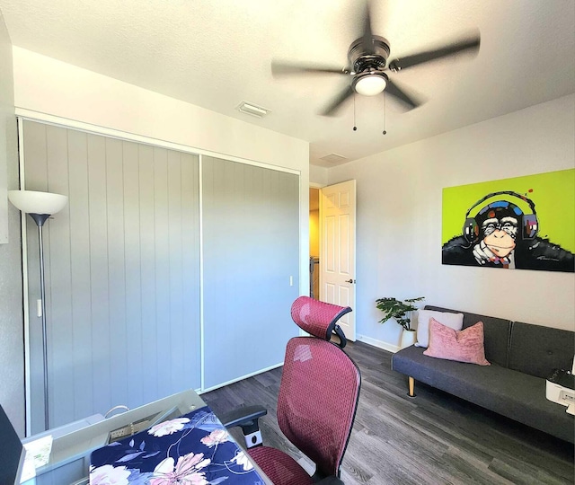 2247 SW Cape Cod Dr, Port Saint Lucie, FL 34953 - home office with dark wood-type flooring and a ceiling fan