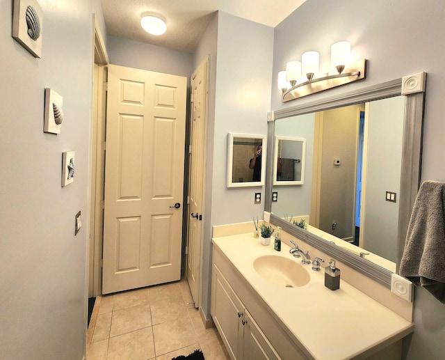 2247 SW Cape Cod Dr, Port Saint Lucie, FL 34953 - bathroom with vanity and tile patterned floors