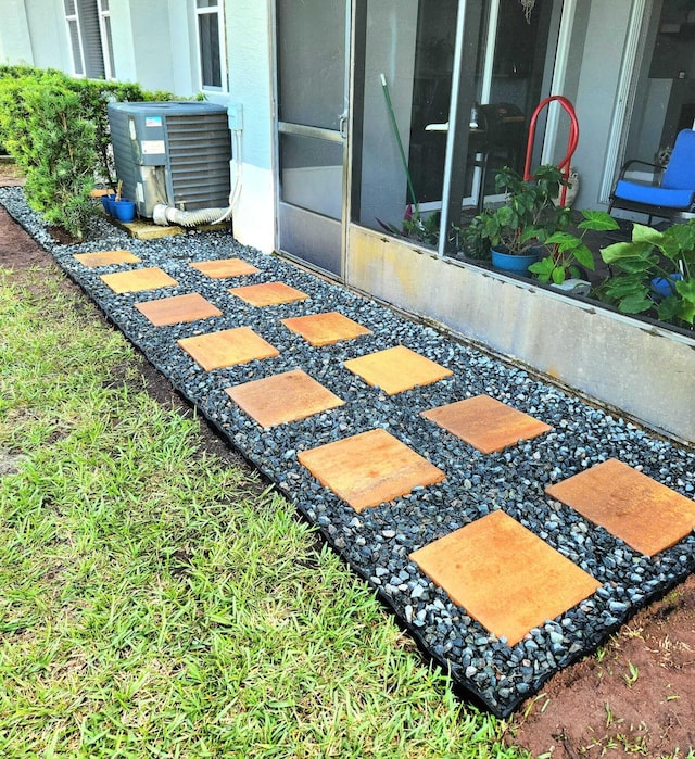 2247 SW Cape Cod Dr, Port Saint Lucie, FL 34953 - exterior view of a central air condition unit
