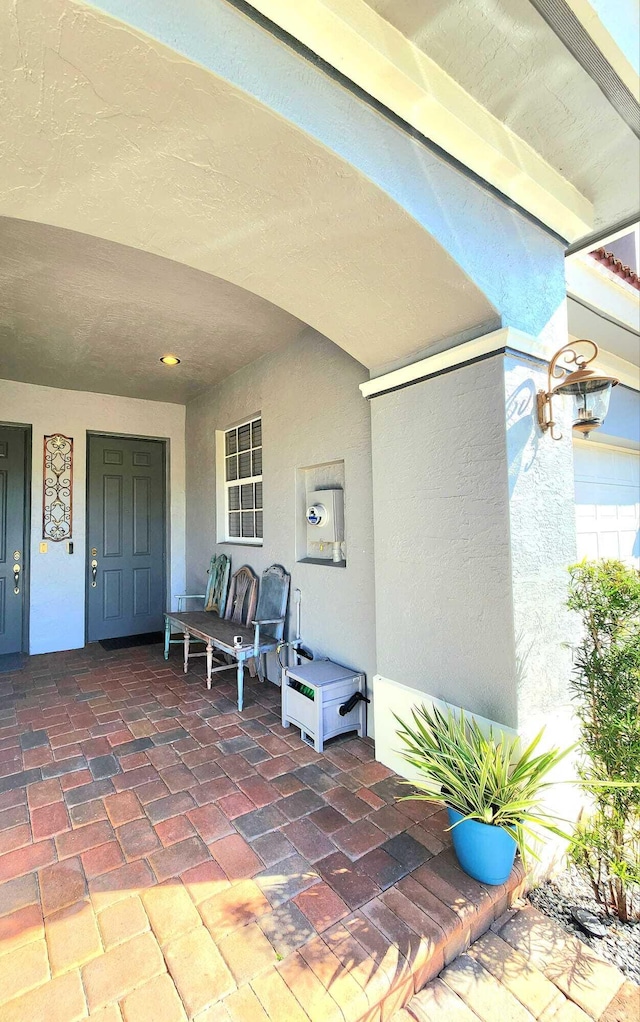 2247 SW Cape Cod Dr, Port Saint Lucie, FL 34953 - property entrance with stucco siding