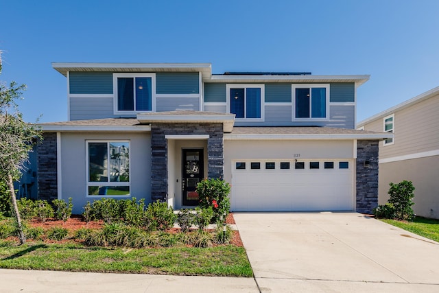 1123 Sugarwood St, Davenport, FL 33837 - view of front facade featuring an attached garage, driveway, and roof with shingles