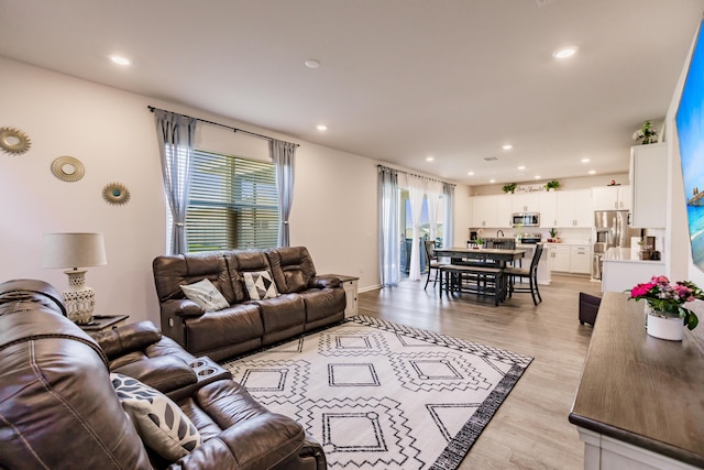 1123 Sugarwood St, Davenport, FL 33837 - living area featuring recessed lighting and light wood-style flooring