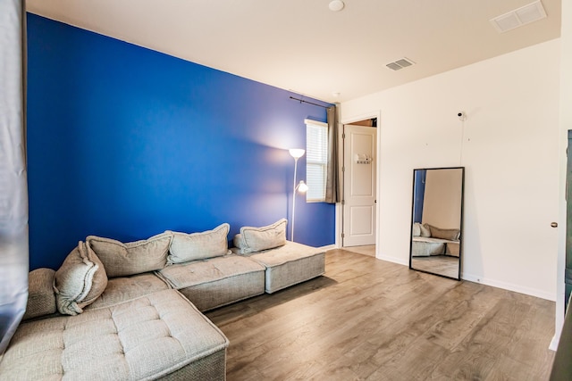 1123 Sugarwood St, Davenport, FL 33837 - living area with wood finished floors and baseboards