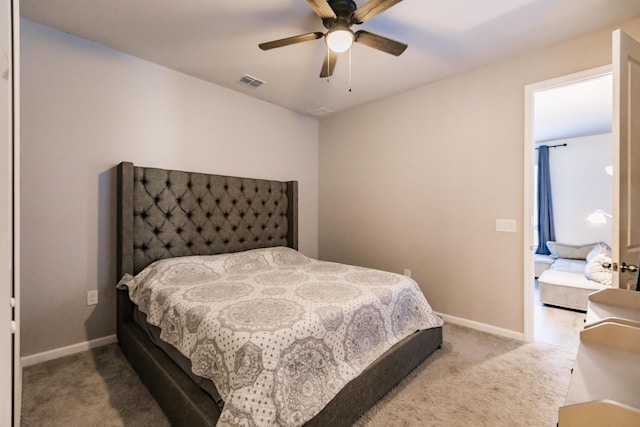 1123 Sugarwood St, Davenport, FL 33837 - carpeted bedroom with baseboards and ceiling fan
