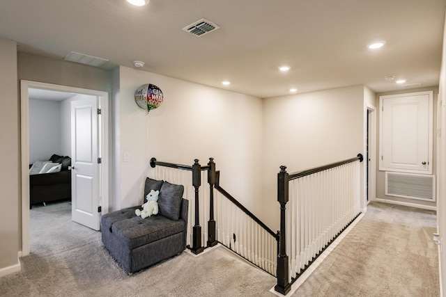 1123 Sugarwood St, Davenport, FL 33837 - sitting room featuring light colored carpet, an upstairs landing, and recessed lighting